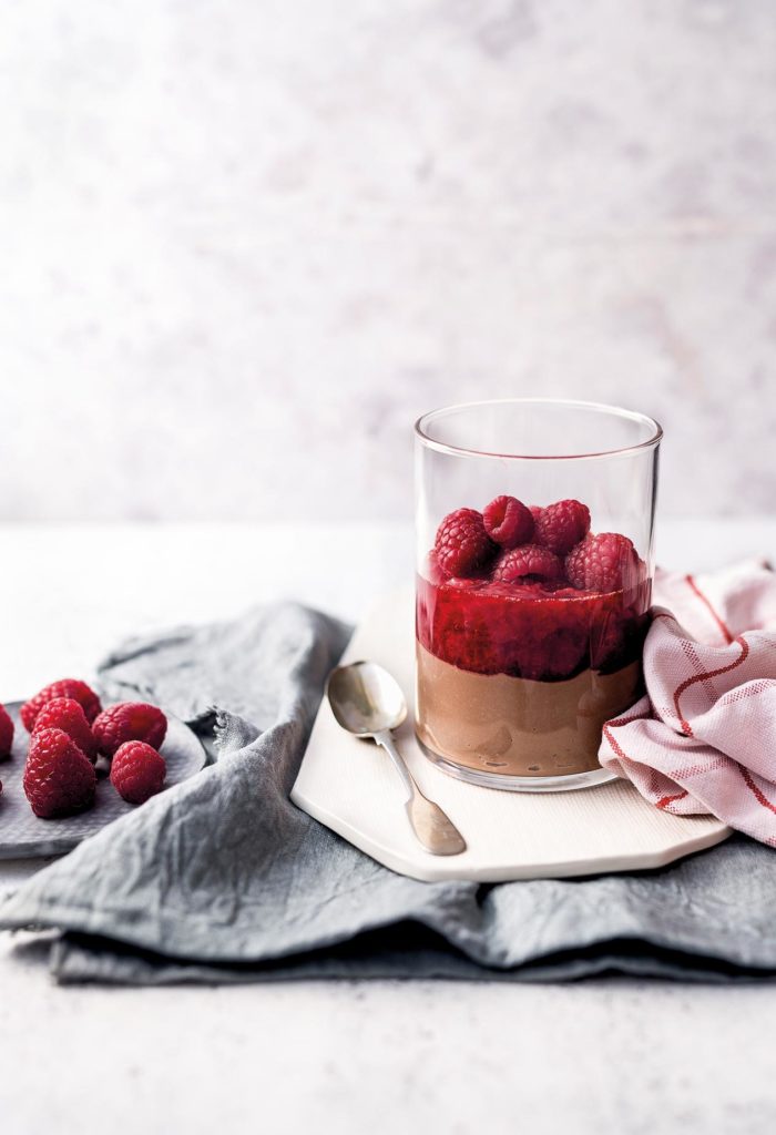 Chocolate creamy mousse with raspberries