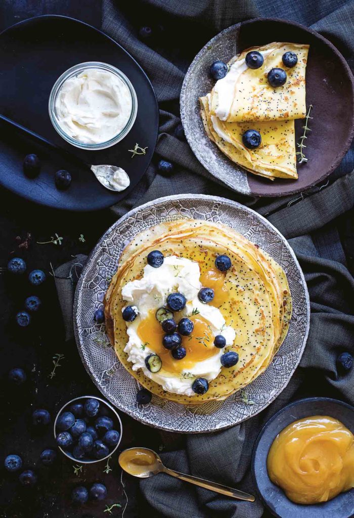 Lemon and poppy seed crêpes with cheese and lemon curd