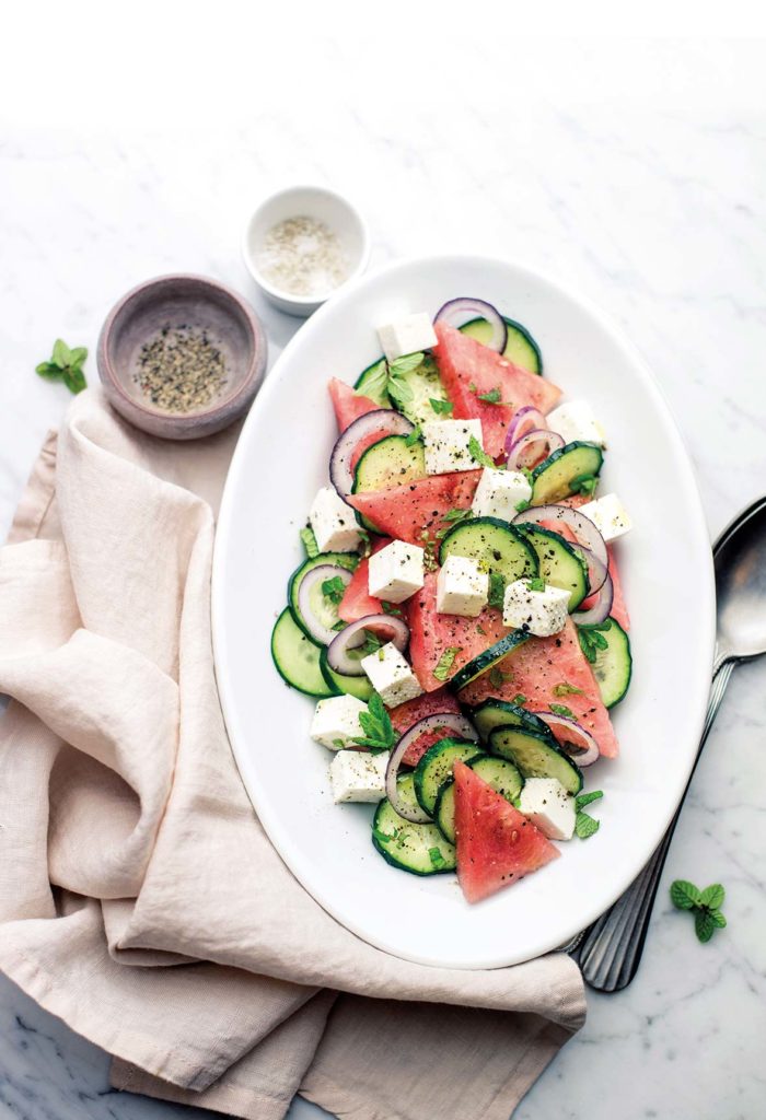 Watermelon salad with cucumbers and primosale cheese