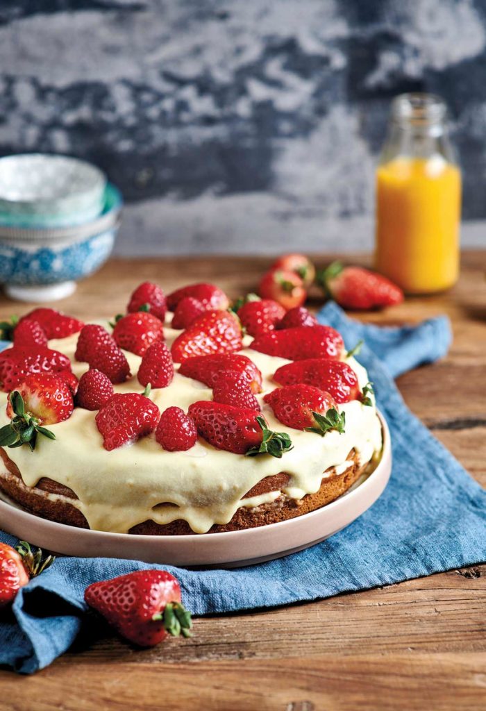 Cake with Chantilly cream, strawberries and raspberries